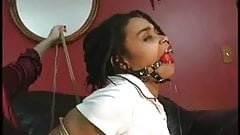ebony woman tied to a chair