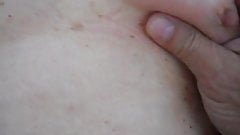 squeezing tit and rubbing clit